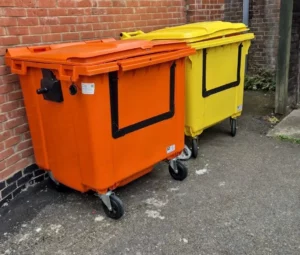 Secondhand 1100L Plastic Wheelie Bin with Drop Front & Lid Lock