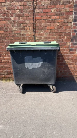 Secondhand 660L Plastic Wheelie Bin in Black with Green Lid